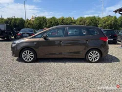 Brązowy Używany 2013 Kia Carens 2 Minivan | 35 990 zł (Dość drogi)