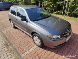 Grafitowy Używany 2004 Nissan Almera Hatchback | 9699 zł (Dość drogi)