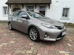Szary Używany 2014 Toyota Auris Hybrid Kombi | 43 900 zł (Uczciwa cena)
