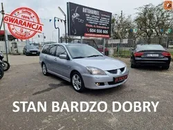 Srebrny (metalik) Używany 2004 Mitsubishi Lancer Kombi | 7490 zł