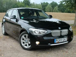Czarny Używany 2011 BMW 116 Comfort Edition Hatchback | 29 999 zł (Uczciwa cena)