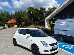 Biały Używany 2009 Suzuki Swift | 12 800 zł (Uczciwa cena)