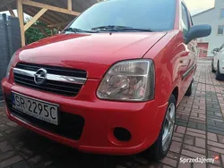 Czerwony Używany 2006 Opel Agila Hatchback | 6700 zł