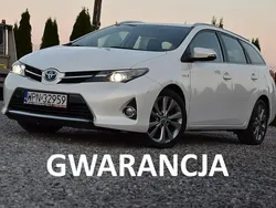 Biały Używany 2014 Toyota Auris Hybrid Kombi | 39 900 zł (Uczciwa cena)