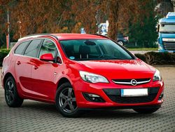 Czerwony Używany 2014 Opel Astra Kombi | 25 900 zł (Uczciwa cena)