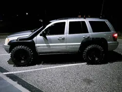Srebrny Używany 2003 Jeep Grand Cherokee SUV | 28 000 zł