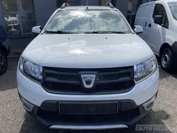 Biały Używany 2014 Dacia Sandero Hatchback | 23 900 zł (Uczciwa cena)