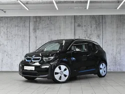 Płynny czarny z akcentem w kolorze niebieskim bmw i Używany 2021 BMW i3 Comfort Edition Hatchback | 96 800 zł (Dość drogi)
