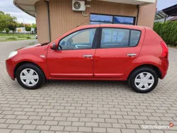 Bordowy Używany 2009 Dacia Sandero Hatchback | 11 300 zł (Uczciwa cena)