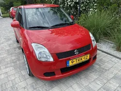 Czerwony Używany 2010 Suzuki Swift Hatchback | 17 900 zł