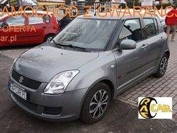 Szary (metalik) Używany 2009 Suzuki Swift Hatchback | 15 999 zł (Uczciwa cena)