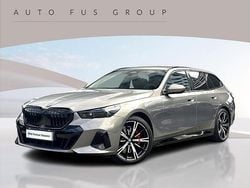 Szary oxide metalizowany Używany 2024 BMW 520 Comfort Edition Kombi | 285 900 zł (Drogi)