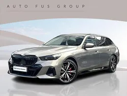 Szary oxide metalizowany Używany 2024 BMW 520 Comfort Edition Kombi | 285 900 zł (Drogi)