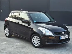 Czarny Używany 2011 Suzuki Swift Hatchback | 26 900 zł
