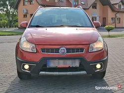 Pomarańczowy Używany 2010 Fiat Sedici SUV | 19 900 zł (Uczciwa cena)
