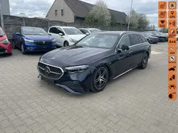 Niebieski ciemny (metalik) Używany 2024 Mercedes E450 Kombi | 219 900 zł