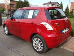 Czerwony ciemny (metalik) Używany 2013 Suzuki Swift Comfort Hatchback | 24 500 zł