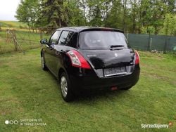 Czarny Używany 2012 Suzuki Swift Hatchback | 24 500 zł (Dość drogi)