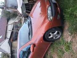 Pomarańczowy Używany 1996 Opel Tigra Hatchback | 3500 zł