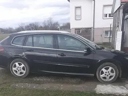 Czarny Używany 2011 Renault Laguna III Kombi | 21 000 zł (Dość drogi)