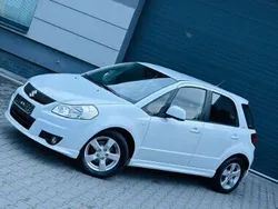 Biały Używany 2012 Suzuki SX4 SUV | 26 900 zł (Uczciwa cena)