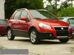 Pomarańczowy (metalik, perła) Używany 2014 Fiat Sedici SUV | 39 700 zł (Dość drogi)