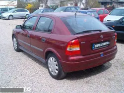 Czerwony (metalik) Używany 2000 Opel Astra Hatchback | 8000 zł