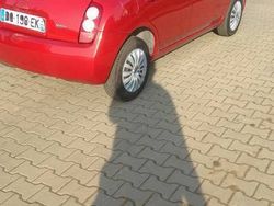 Wiśniowy Używany 2005 Nissan Micra Hatchback | 9500 zł (Uczciwa cena)