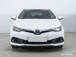 Biały Używany 2016 Toyota Auris Hybrid Hatchback | 59 999 zł (Uczciwa cena)
