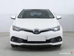 Biały Używany 2016 Toyota Auris Hybrid Hatchback | 60 999 zł (Uczciwa cena)