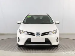 Biały Używany 2014 Toyota Auris Hybrid Kombi | 46 999 zł (Uczciwa cena)