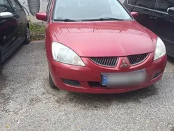 Czerwony Używany 2005 Mitsubishi Lancer Kombi | 6000 zł