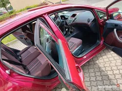 Bordowy Używany 2009 Ford Fiesta Hatchback | 14 250 zł (Uczciwa cena)