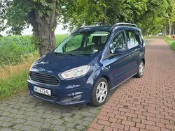 Niebieski Używany 2014 Ford Tourneo Courier Minivan | 23 999 zł (Uczciwa cena)