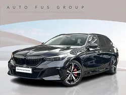 Czarny carbon m metalizowany Używany 2024 BMW 550e Comfort Edition Kombi | 379 900 zł