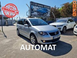 Srebrny Używany 2010 VW Touran Minivan | 29 990 zł (Uczciwa cena)
