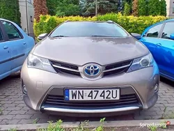 Beżowy Używany 2014 Toyota Auris Hybrid Kombi | 56 500 zł (Uczciwa cena)