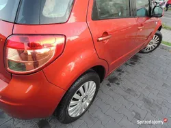 Czerwony Używany 2006 Suzuki SX4 Sedan/Limuzyna | 13 700 zł (Uczciwa cena)