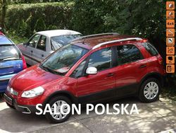 Pomarańczowy (metalik, perła) Używany 2014 Fiat Sedici SUV | 39 800 zł (Drogi)