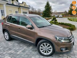 Brązowobeżowy Używany 2014 VW Tiguan SUV | 49 800 zł (Uczciwa cena)