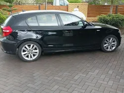Czarny Używany 2009 BMW 116 Hatchback | 14 500 zł (Uczciwa cena)