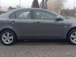 Czerwony Używany 2009 Mitsubishi Lancer Sedan/Limuzyna | 15 700 zł (Dobra cena)