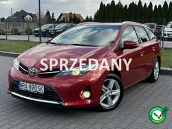 Bordowy (metalik, perła) Używany 2014 Toyota Auris Hybrid Kombi | 46 900 zł (Uczciwa cena)