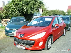 Wiśniowy Używany 2009 Peugeot 308 Hatchback | 9400 zł (Uczciwa cena)