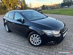 Czerwony Używany 2014 Seat Leon Kombi | 29 500 zł (Dość drogi)