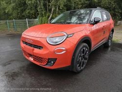 Lakier metalizowany pomarańczowy sole z dachem w kolorze czarny cinema Nowe 2025 Fiat 600 La Prima Hatchback | 108 212 zł (Uczciwa cena)