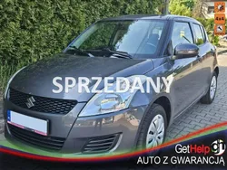Szary Używany 2013 Suzuki Swift Hatchback | 25 900 zł (Uczciwa cena)