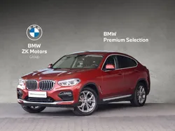 Czerwony flamenco z brylantowym połyskiem metalizowany Używany 2021 BMW X4 xLine SUV | 188 900 zł (Drogi)