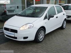 Biały Używany 2010 Fiat Grande Punto Hatchback | 21 890 zł