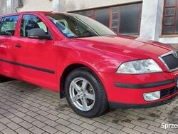 Czerwony Używany 2011 Skoda Octavia Kombi | 11 700 zł (Dobra cena)